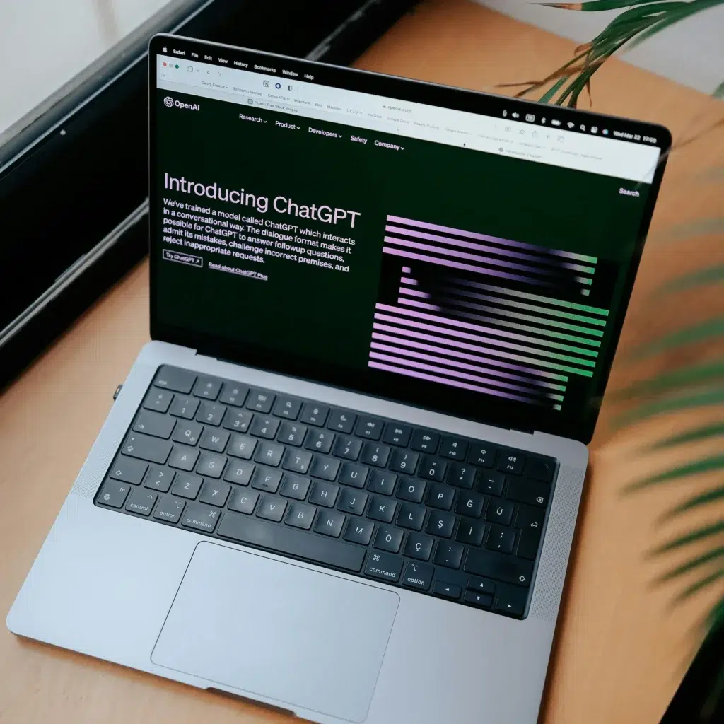 A laptop displays the ChatGPT introduction page from OpenAI, symbolizing OpenAI for Employee Efficiency through smarter workflows, conversational AI, and productivity-enhancing tools for modern teams